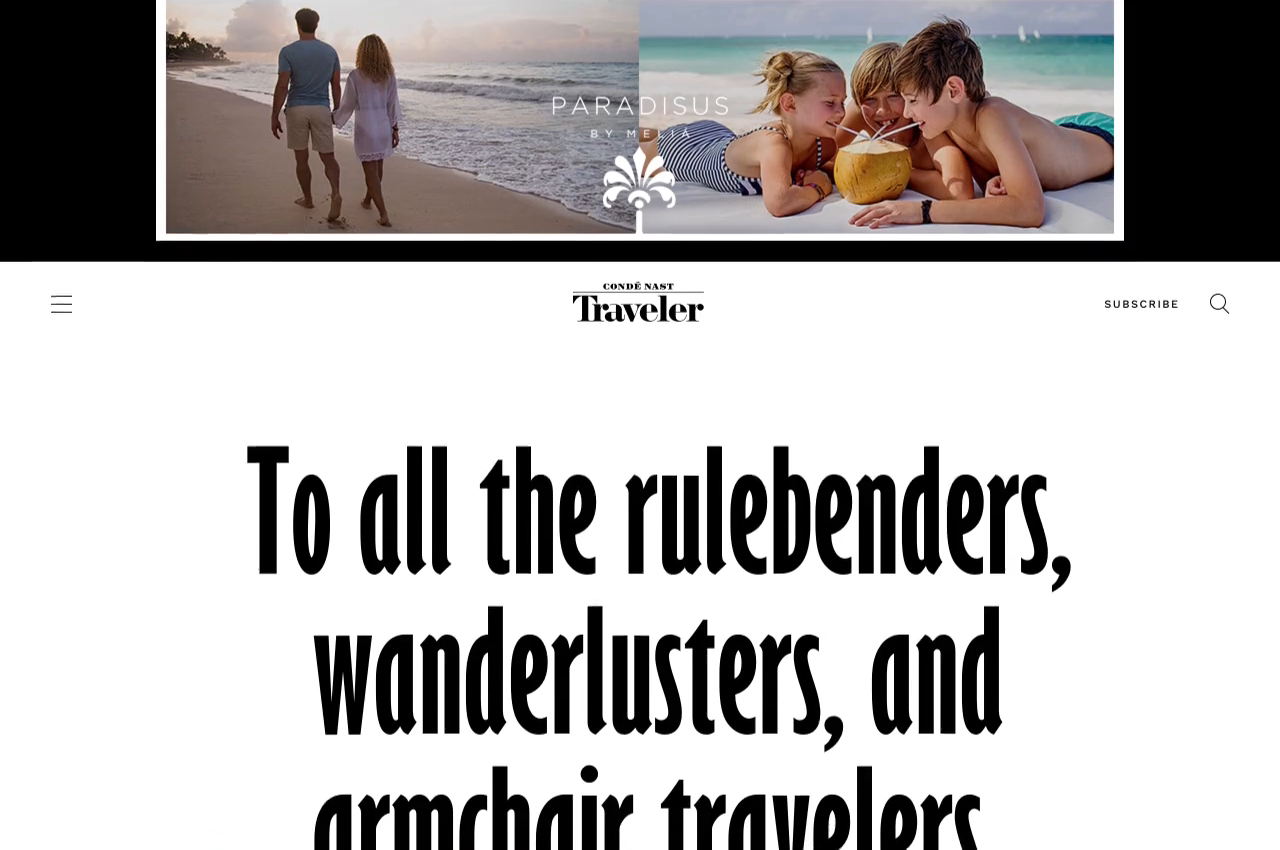 Condé Nast Traveler homepage hero with a couple walking on a beach